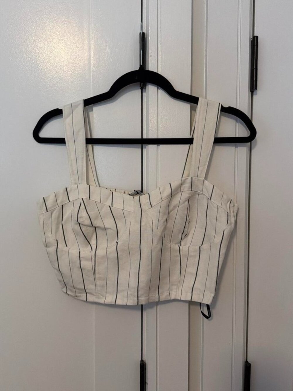 White crop top with thin black vertical stripes